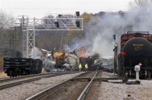Several cars from a Canadian National freight train are seen on fire after they derailed between the Chicago suburbs of Bartlett and Elgin