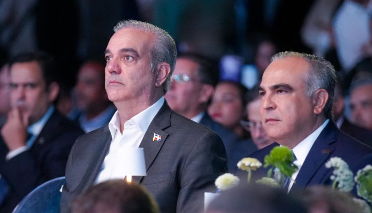 Luis Abinader y Celso Juan Marranzini en actividad de Conep.